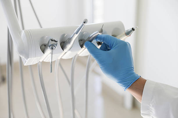 Professional Tooth Extraction technician working in Brazoria County County, TX